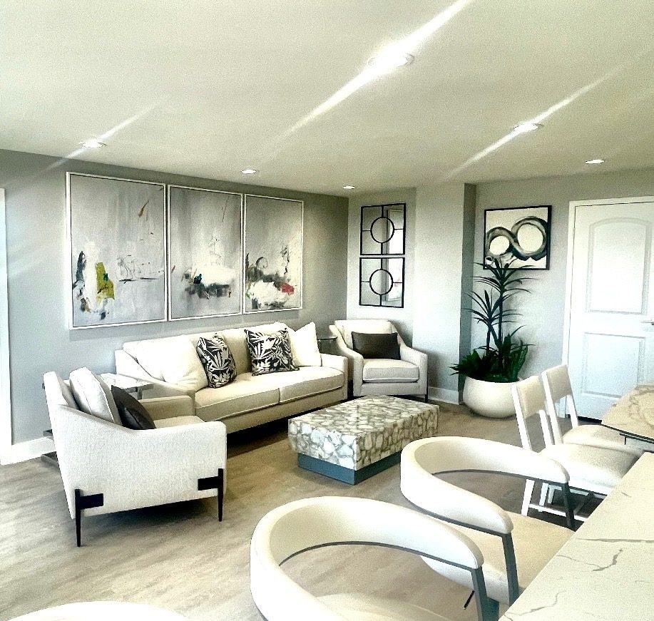 Condo Living Room: triptych art, marble-look cocktail table, open plan, designed and furnished by John Hashempour